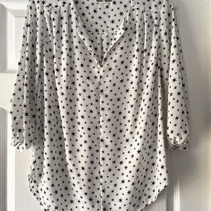 Silky blouse with 3/4 length sleeves.  Great condition!